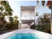 Villa vanguardista en primera línea de playa con piscina...