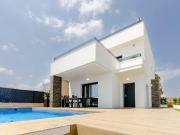 Villas independientes ubicadas junto al campo de golf...