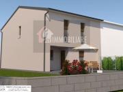 Villetta a schiera di testa in costruzione