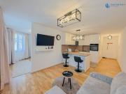 Voll möblierte Neubauwohnung mit Garage !