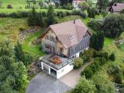 VOLLHOLZHAUS MIT UMSCHWUNG UND WEITSICHT