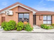 Walk to Cafés, Parks and Trains from This Peaceful Retreat