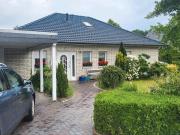 Walmdach Bungalow, Wintergarten Kamin