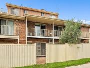 Well kept townhouse provides easy and private living