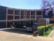 Well located development corner first floor unit within...