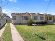 WELL MAINTAINED HOME PACKED WITH POTENTIAL!