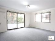Well Maintained Top Floor Unit