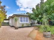 Well Presented Home Industrial Zoned Land!