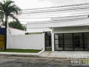White Bungalow along Main Thoroughfare in BF homes
