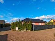 Winkelbungalow mit Einliegerwohnung in Top Lage