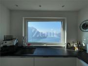 Wir vermieten eine Wohnung mit Blick auf den Luganersee