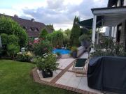 Wohnung wie ein Haus im Haus mit Garten und Pool