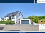 Zeitlose Architektur in naturnaher Lage –...