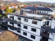 Zentral gelegen: 3 ZKB mit Stellplatz & Fußbodenheizung...