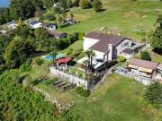 ZU VERKAUFEN IN VAL RESA Brione sopra Minusio HAUS MIT...