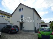 Zweifamilienhaus mit Einliegerwohnung, 2 Garagen in...