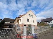 Zweifamilienhaus mit Garten & Garagen – viel Potenzial...