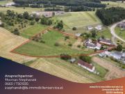 Zweifamilienhaus mit Nebengebäuden und großem Grundstück...