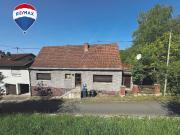Zwischen Natur und Stadt: Wohnhaus mit...